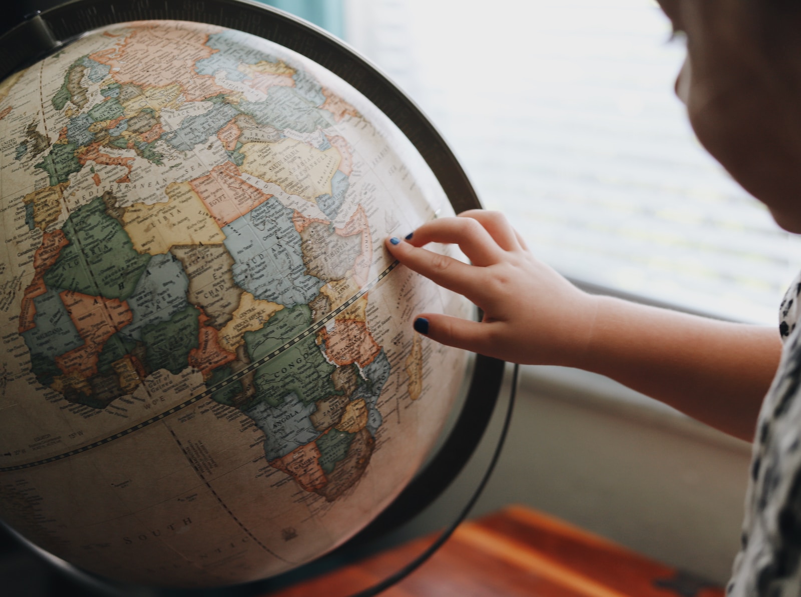 beige and blue desk globe