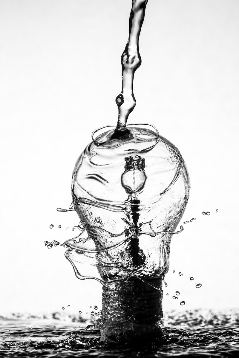 water dropping on light bulb