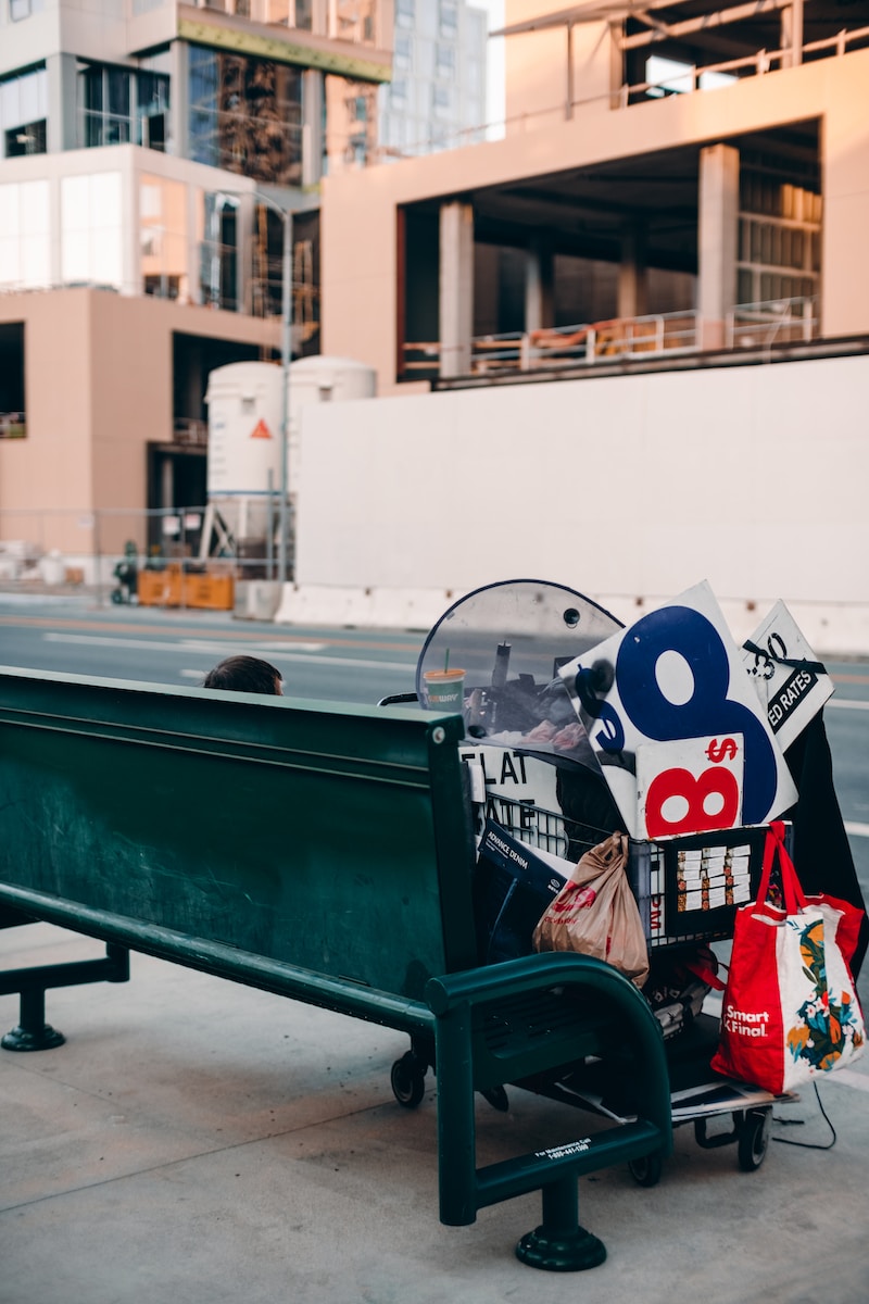 Photo by Kayle Kaupanger a bench with a sign on it