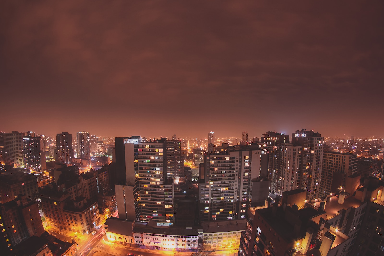 Photo by Jorge Mülchi Cossio aerial photography of city during night